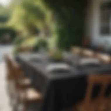 Black oval table cloth used in a casual outdoor setting